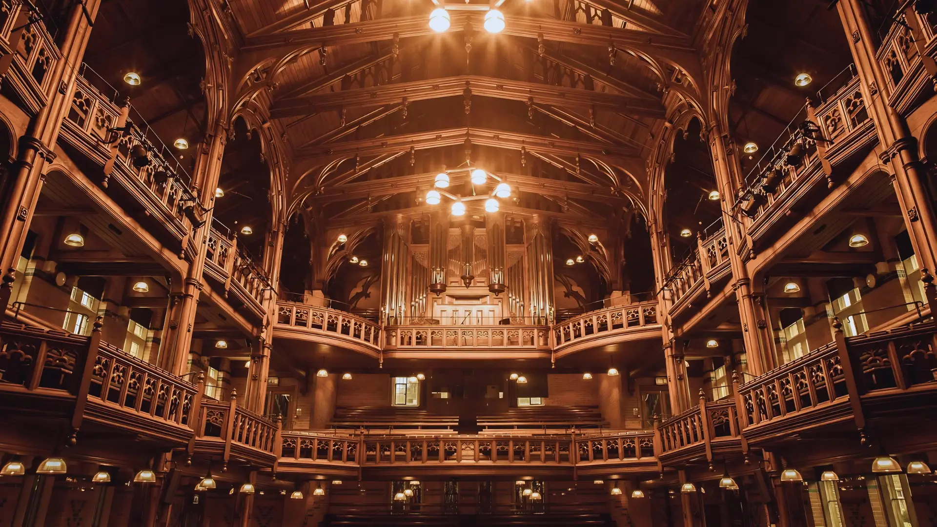 Cheltenham Ladies’ College Princess Hall filled with students, families and guests during a live orchestral performance.